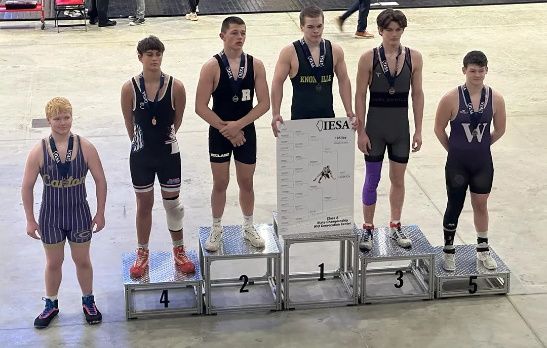 Knoxville Jr. High School's James Long, center, won the 185 Class A championship at the Illinois Elementary School Association State Wrestling Tournament on Saturday at the NIU Convocation Center in DeKalb. (Submitted photo)