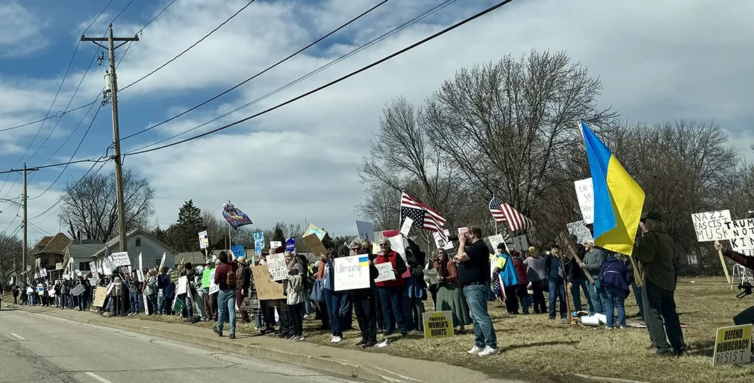 More than 200 people gathered Sunday on East Main Street in Galesburg for what organizers called a rally for democracy. 