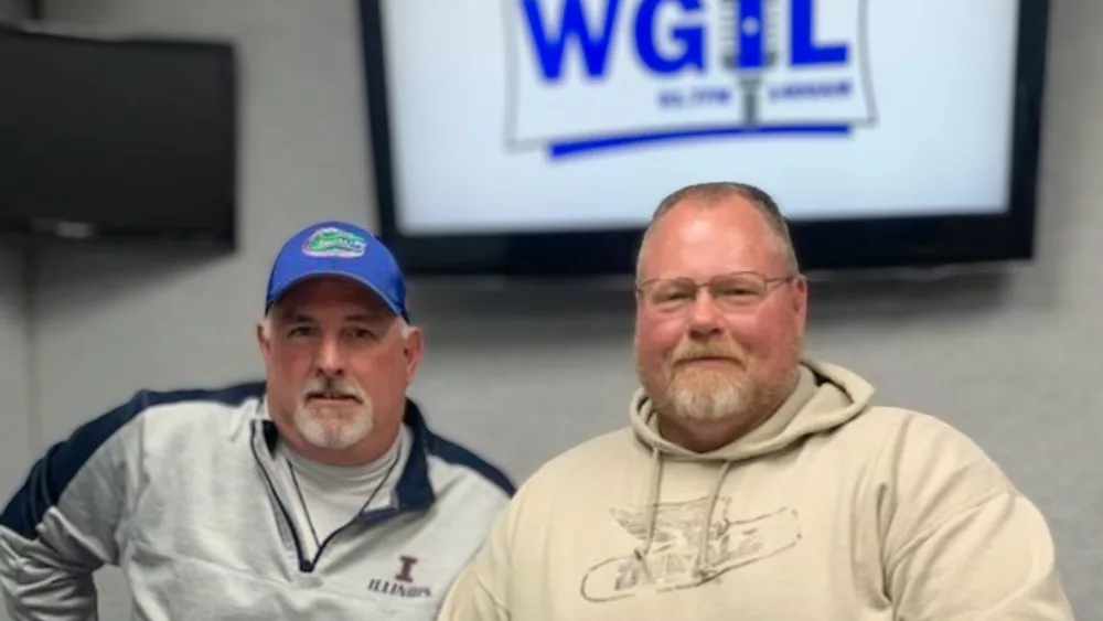 Jim Anderson, left, of North-And Company, a Galva-based crop insurance and commodities brokerage firm, and Lance Tarochione, a technical agronomist with DEKALB and Asgrow under Bayer Cropscience.. (