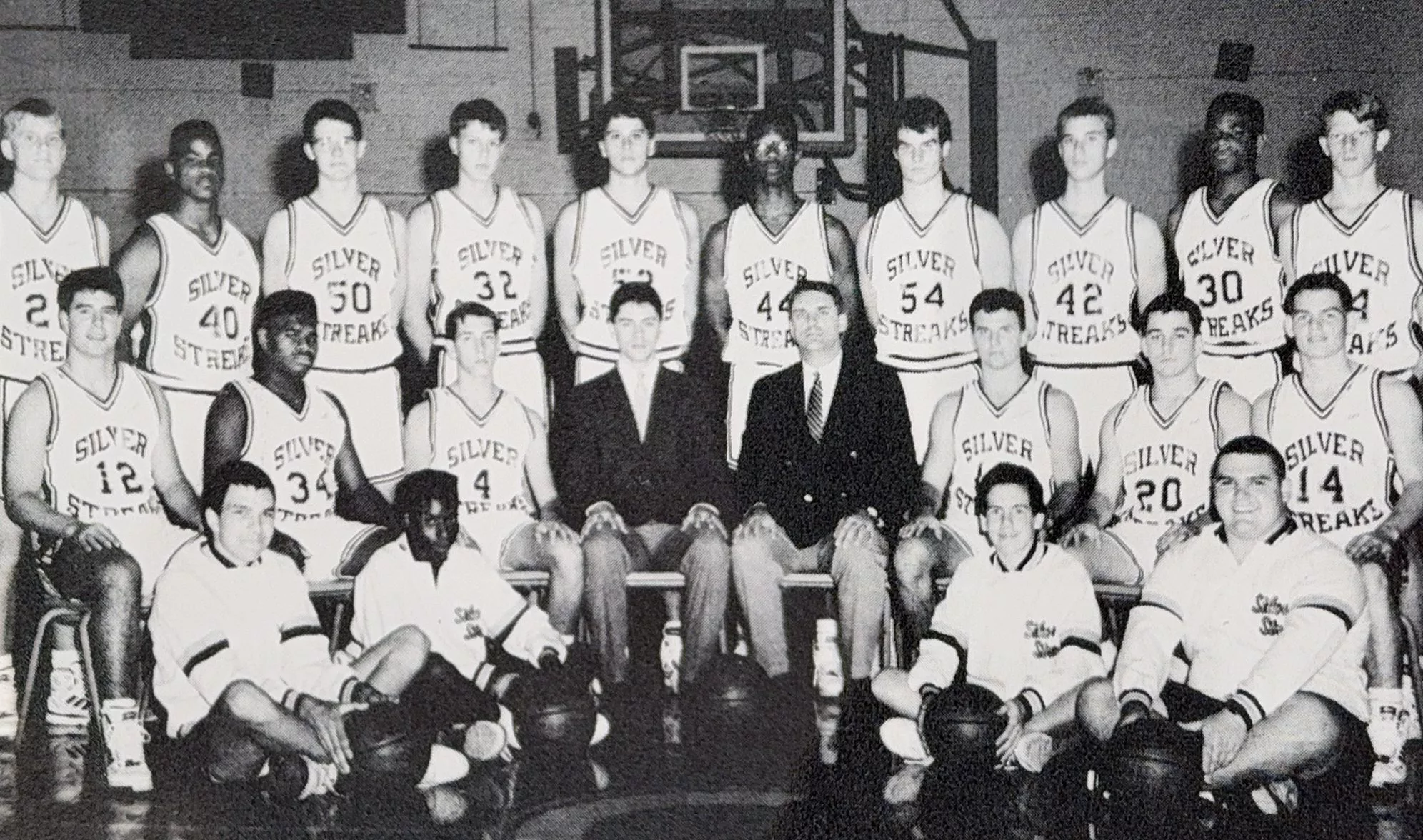 TJ Pendleton (No. 30), back row, as a member of the Silver Streaks basketball team.