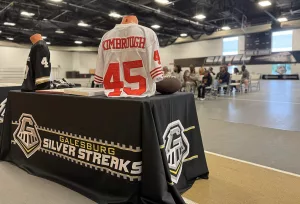 A vibrant mural of Albert and Elbert Kimbrough, frozen in their 1950s football glory, now graces the newly christened Kimbrough Fieldhouse at Galesburg Jr./Sr. High School, unveiled during a heartfelt dedication ceremony on Sunday, May 25, 2025.