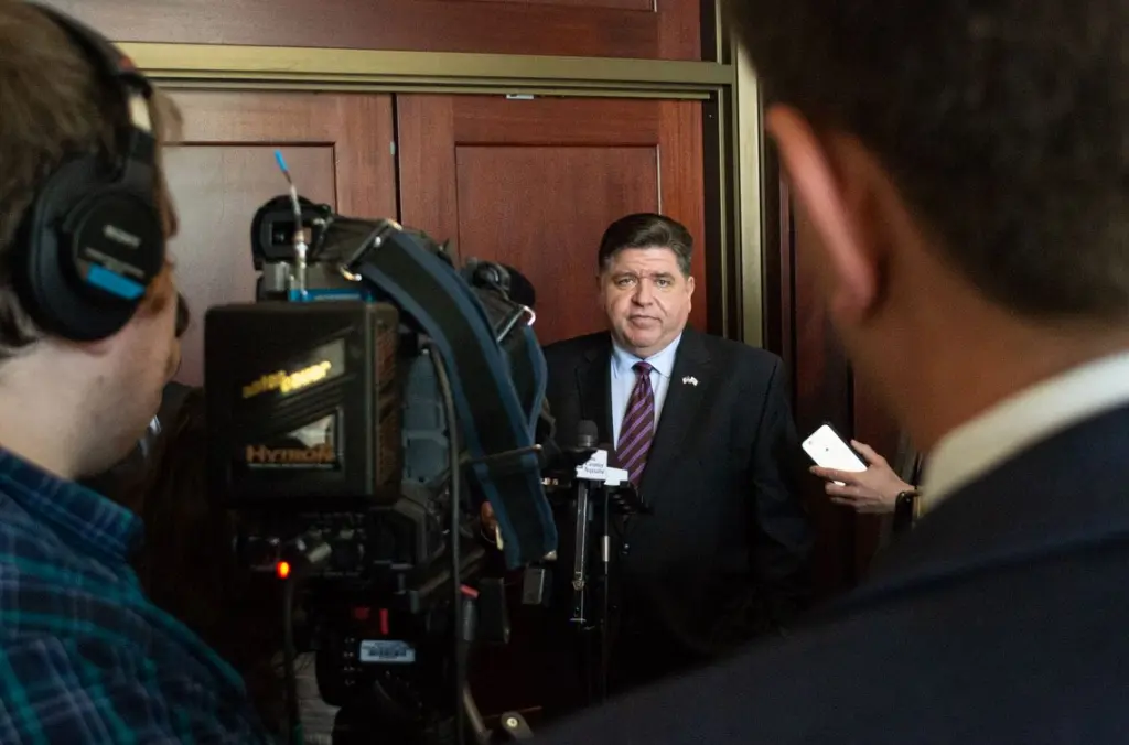 Gov. JB Pritzker speaks to reporters following an event at the Illinois State Library in Springfield on Wednesday, May 28, 2025. Pritzker pledged to veto any budget with “broad-based” tax increases. (Capitol News Illinois photo by Jerry Nowicki)
