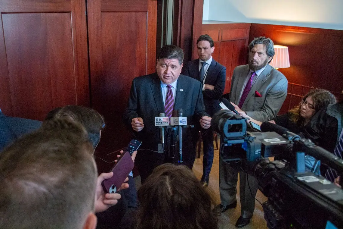Gov. JB Pritzker speaks to reporters following an event at the Illinois State Library in Springfield on Wednesday, May 28, 2025. Pritzker pledged to veto any budget with “broad-based” tax increases. (Capitol News Illinois photo by Jerry Nowicki)