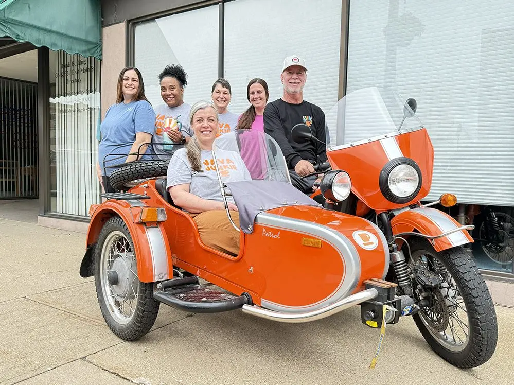 The Orange Cup Family, clockwise from left: Alyssa Sloan, LaToya Carson, Melany Baldwin, Amanda Bauchman, Scott Baldwin and Sarah Baldwin.