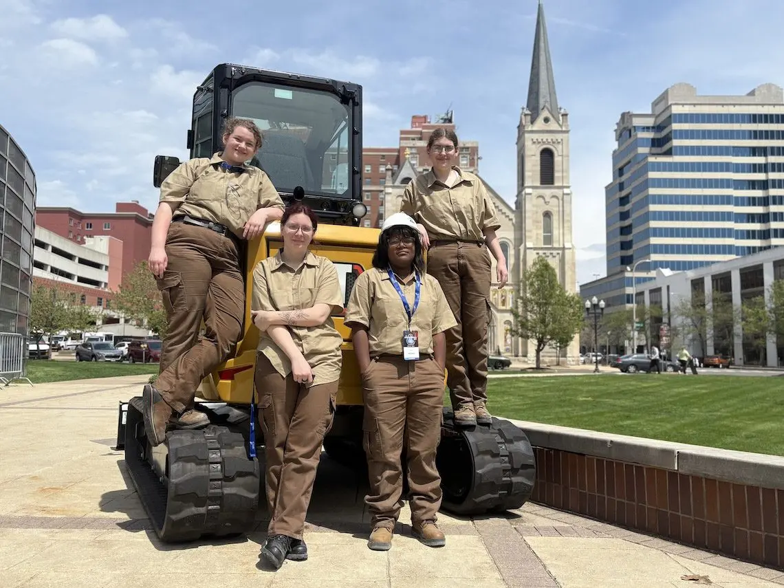 The first all-girls construction team to compete at SkillsUSA Illinois poses outside the PeoriaCivic Center after their competition. From left, Aubrey Levin, Kayhl Miles, Amyla Walls and Catelin Wesley. (Medill Illinois News Bureau photo by Maggie Dougherty)