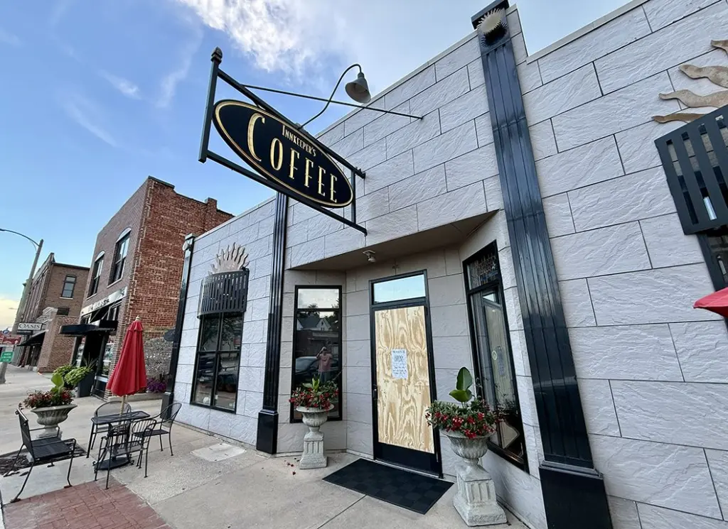 The door at Innkeeper's Fresh Roasted Coffee, 80 N. Seminary St., remains boarded after a break-in early Sunday, July 27, 2025.