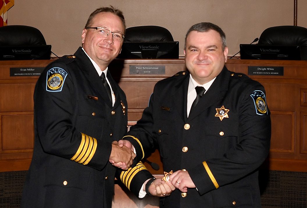 Ryne Sage, right, a 17-year veteran of the Galesburg Police Department, will serve as its deputy chief. He was joined at the ceremony by Chief Kevin Legate. 