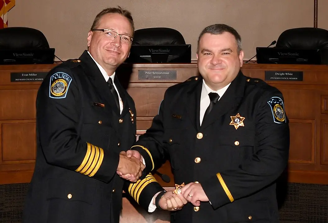 Ryne Sage, right, a 17-year veteran of the Galesburg Police Department, will serve as its deputy chief. He was joined at the ceremony by Chief Kevin Legate.
