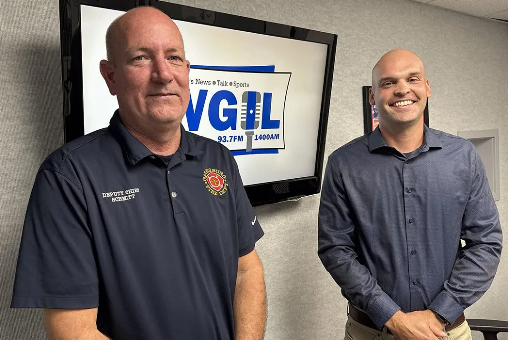 Deputy Chief of Operations Brock Schmitt, left, and Galesburg Firefighter TJ Scott, the new Fill the Boot Coordinator for the IAFF 8th District.