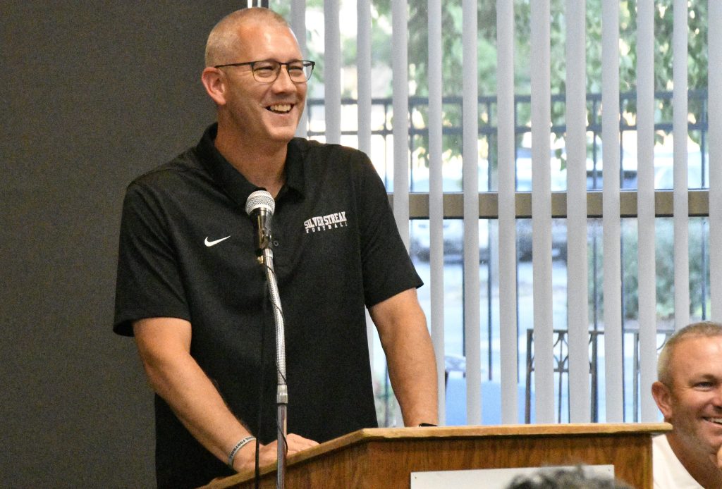 Galesburg Football Coach Shawn Hickey speaks Sunday, Aug. 24, at the 2025 Western Big 6 Conference Football Coaches “Kickoff” Banquet at the Quad Cities Botanical Center. 