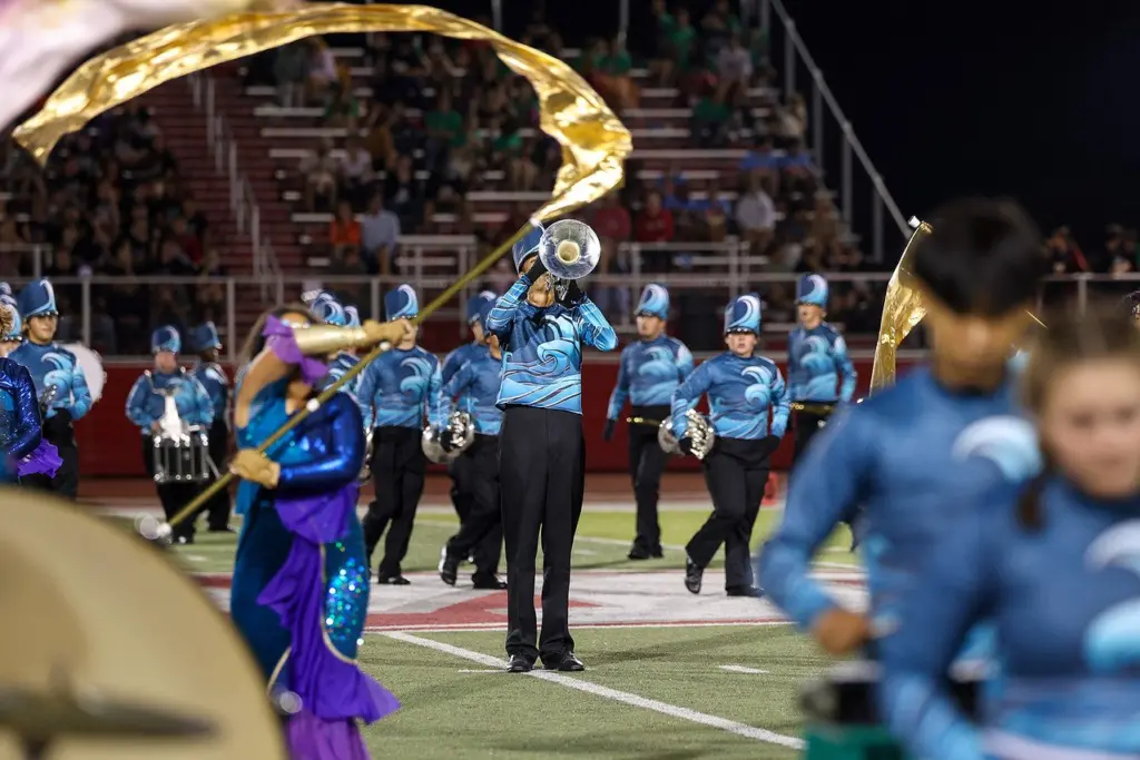 The Galesburg Marching Streaks excelled at the Morton Invitational on Saturday, taking first in Class 4A, Best Auxiliary for their color guard, and the Grand Champion title. (PAUL F PHOTOGRAPHY)