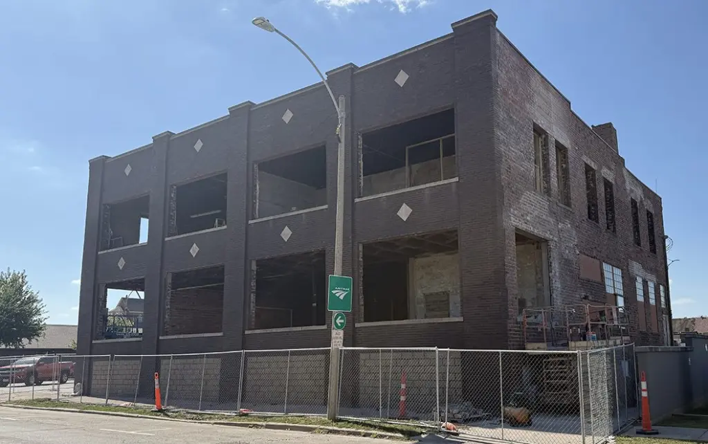 The historic two-story brick building at 277 E. Tompkins in downtown Galesburg undergoes restoration, with plans to transform it into Airbnb-style lodging for visitors.