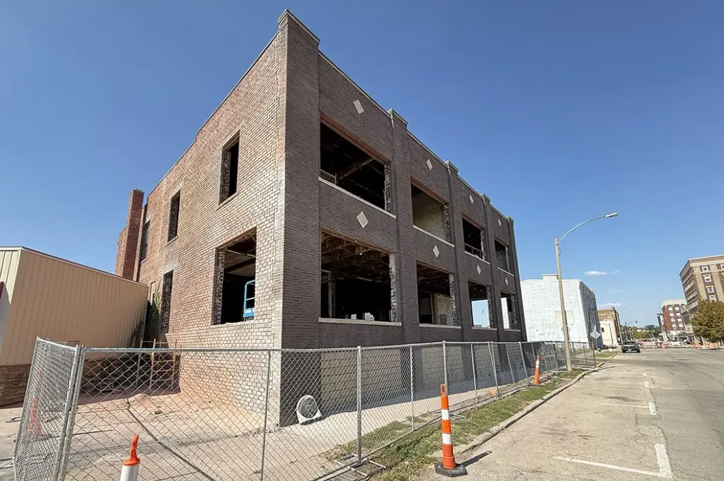 The historic two-story brick building at 277 E. Tompkins in downtown Galesburg undergoes restoration, with plans to possibly transform it into Airbnb-style lodging for visitors. (JAY REDFERN/WGIL)
