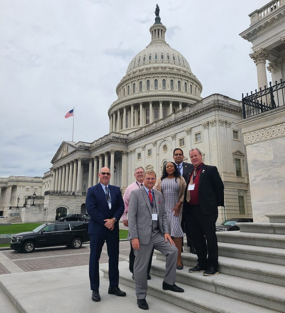  L-R: Cook County Deputy Clerk Edmund Michalowski, Tazewell County Chief Deputy Clerk Dan Sullivan, Tazewell County Clerk & Recorder of Deeds John C. Ackerman, Cook County Clerk & Recorder of Deeds Monica Gordon, Lake County Clerk & Recorder of Deeds Anthony Vega, and Knox County Clerk & Recorder of Deeds Scott Erickson at the United States Capital.