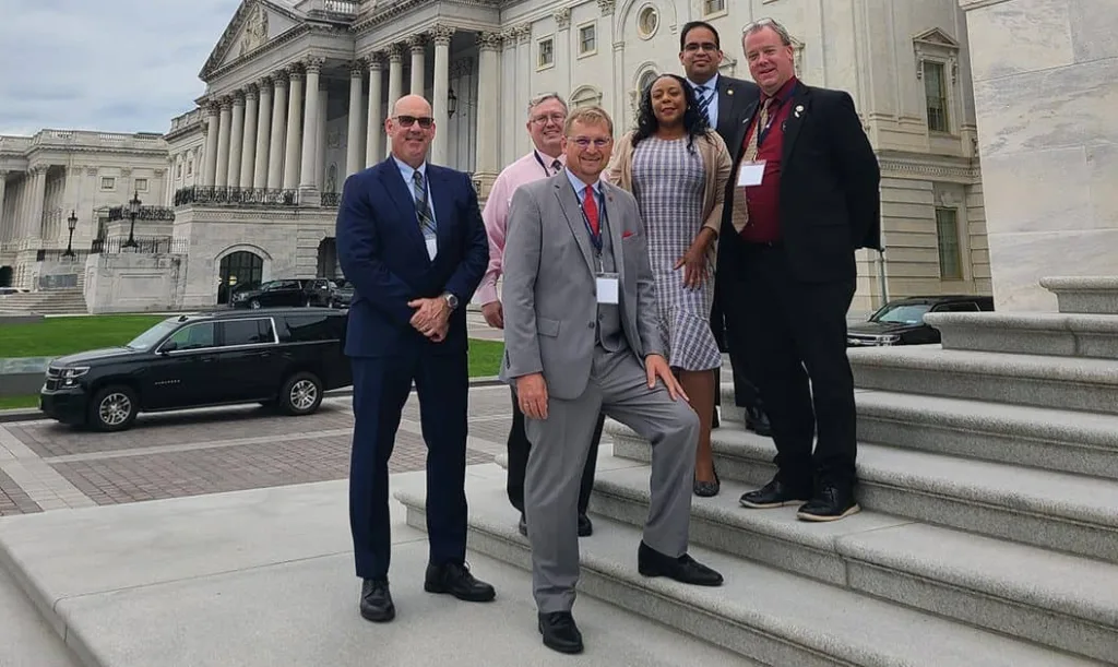 L-R: Cook County Deputy Clerk Edmund Michalowski, Tazewell County Chief Deputy Clerk Dan Sullivan, Tazewell County Clerk & Recorder of Deeds John C. Ackerman, Cook County Clerk & Recorder of Deeds Monica Gordon, Lake County Clerk & Recorder of Deeds Anthony Vega, and Knox County Clerk & Recorder of Deeds Scott Erickson at the United States Capital.