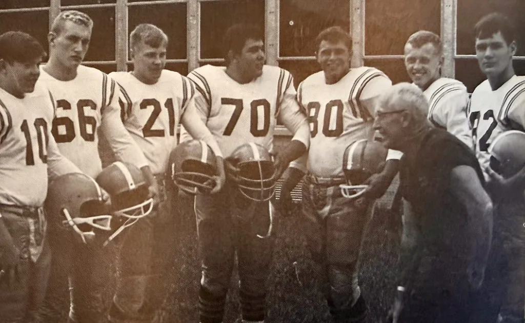 Steve Ferguson, No. 21, poses with other varsity letter winners and Coach C.C. Van Dyke from the 1964 Galesburg Silver Streaks football team.