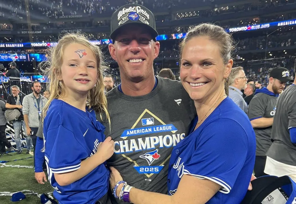 Toronto Blue Jays bullpen coach Graham Johnson joined by wife, Victoria Cable Johnson and daughter, Charlee after Monday night’s game in Toronto at Rogers Centre. (Photo courtesy Victoria Cable-Johnson)