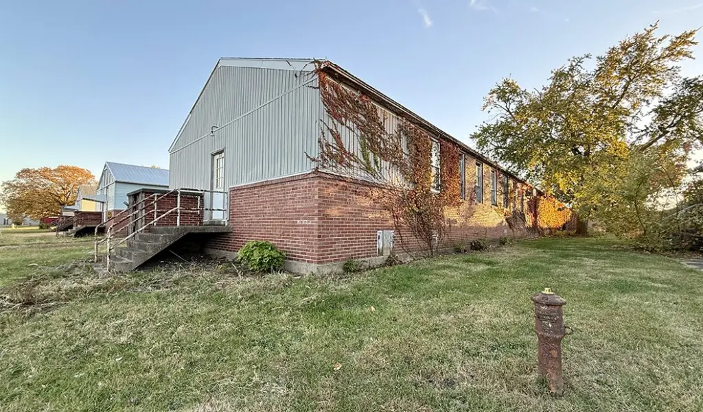 566 Hawthorne Court — part of the former Mayo General Hospital (1943–46), vacant since 2008. Purchased for $813 and slated for demolition. (JAY REDFERN/WGIL)