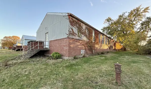 566 Hawthorne Court — part of the former Mayo General Hospital (1943–46), vacant since 2008. Purchased for $813 and slated for demolition. (JAY REDFERN/WGIL)
