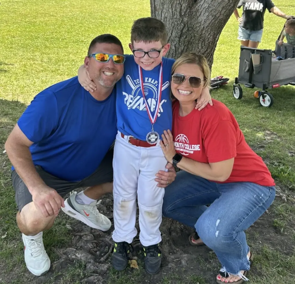 Brian & Stephanie Woodard with their son. 