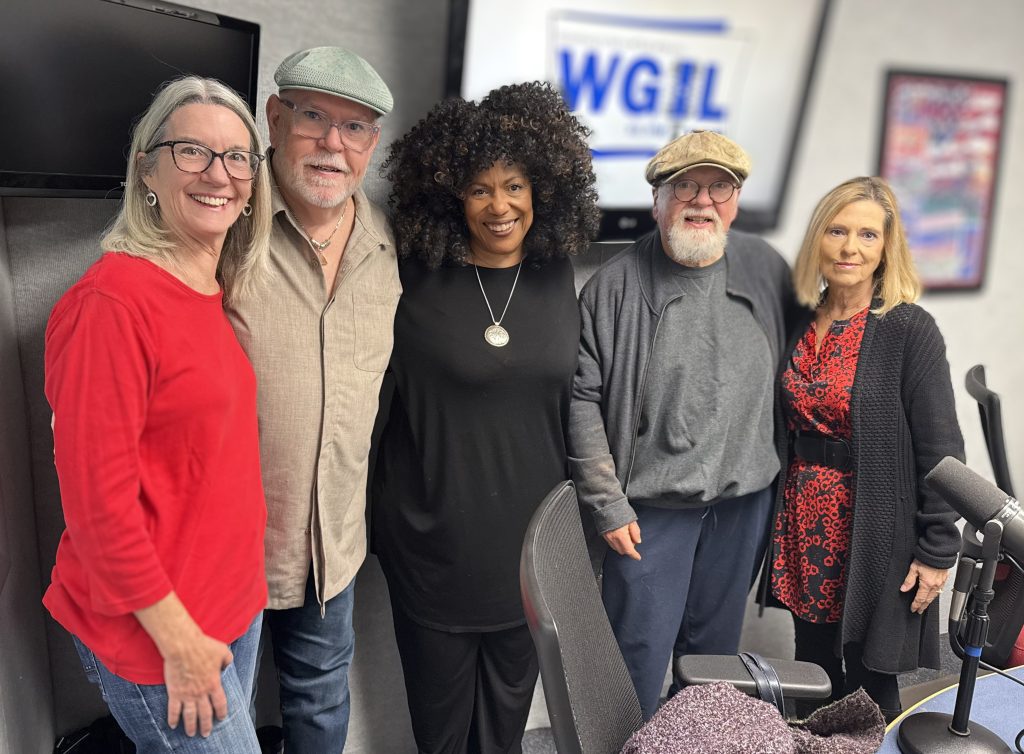 L-R: Lora Wright, Daniel Leahy, Pippi Ardennia, Bobby Dillard, and Becky Fleischer in the WGIL studio ahead of the Lindstrom’s 100th anniversary PD C.A.R.E.S. holiday concert.