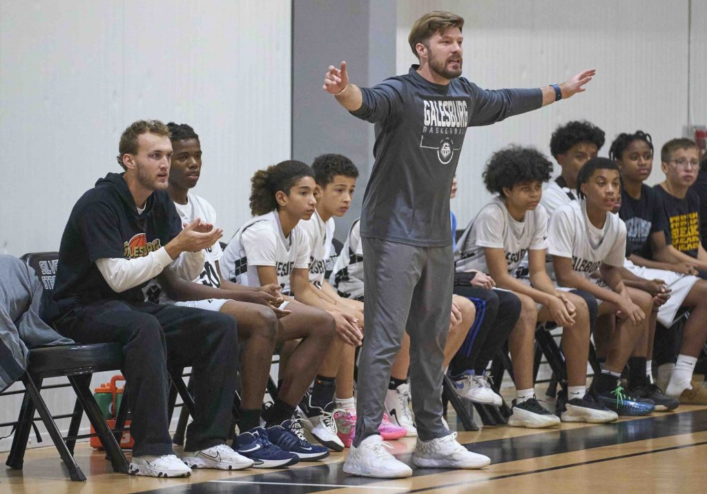 Jordan Ball coaches the Galesburg seventh-grade boys basketball team during a game.