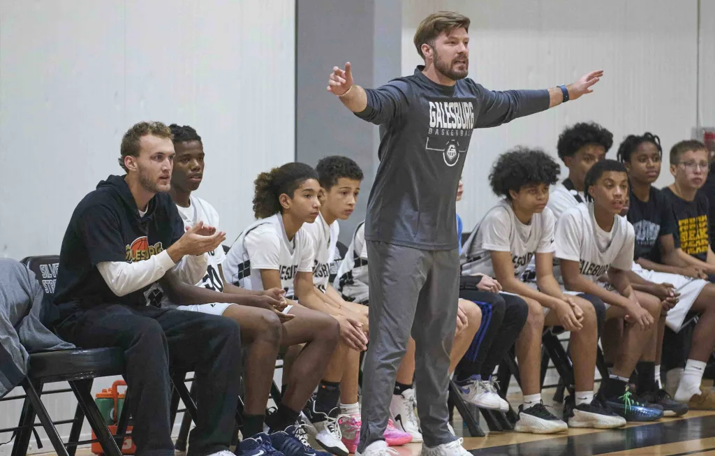 Jordan Ball coaches the Galesburg seventh-grade boys basketball team during a game.