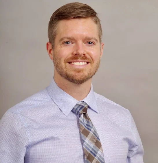 Dr. Craig Wilson, orthopedic surgeon at OSF HealthCare St. Mary Medical Center and Great Plains Orthopedics in Galesburg, smiling in professional portrait.