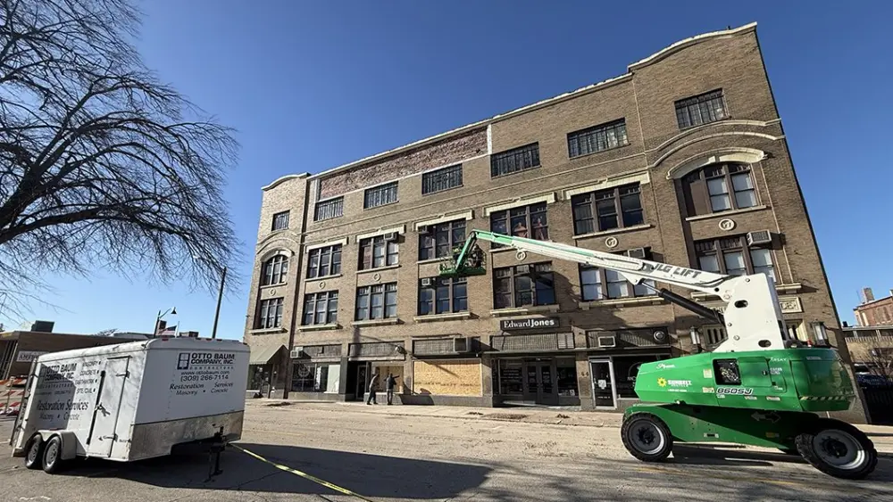 tto Baum Company restoration equipment and workers repairing the Weinberg Arcade building in downtown Galesburg