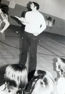 David “D-Dub” Whiteman addressing students and players in the Knoxville High School gymnasium