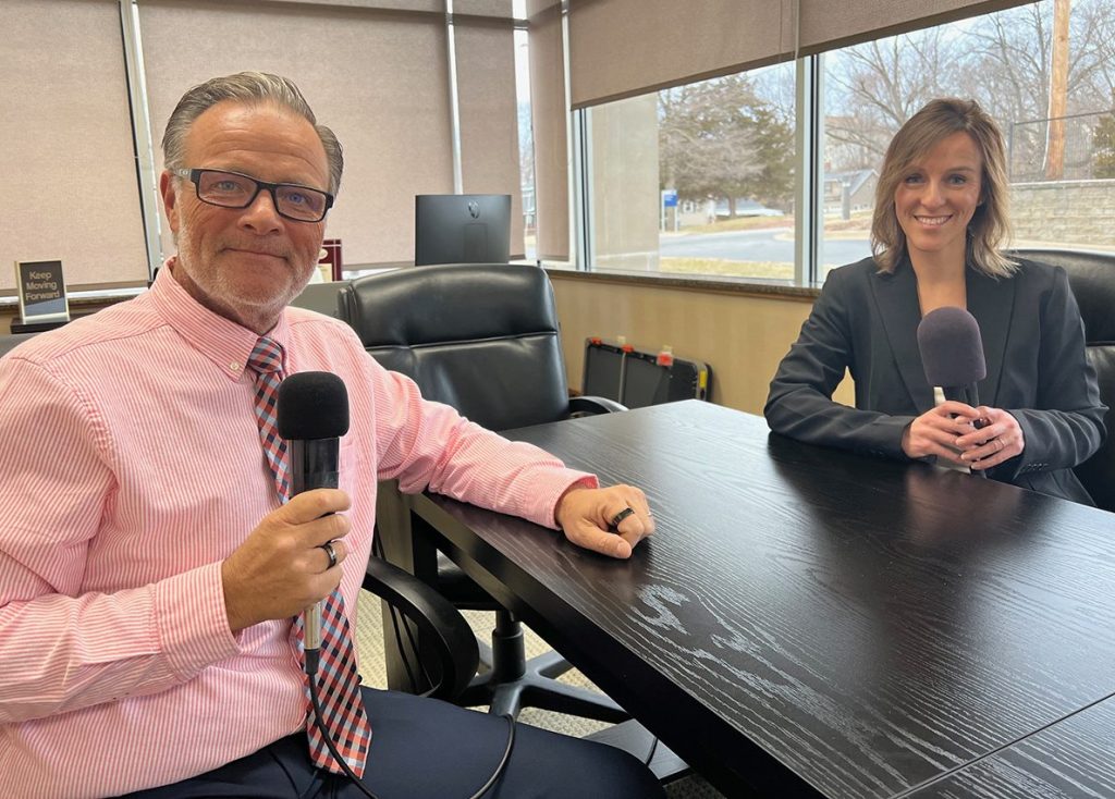 Allison Sours, President and CEO of Graham Health System, seated at conference table during WGIL interview with Chris Postin in Canton, Illinois.