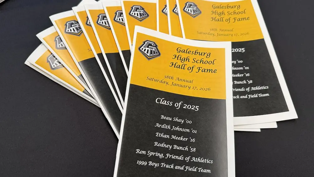 Stack of programs listing the 2025 Galesburg Athletic Hall of Fame inductees at the January 17, 2026, ceremony.