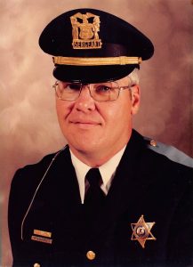 Michael DeForest in Galesburg Police Department uniform as sergeant, longtime captain who retired in 2001.