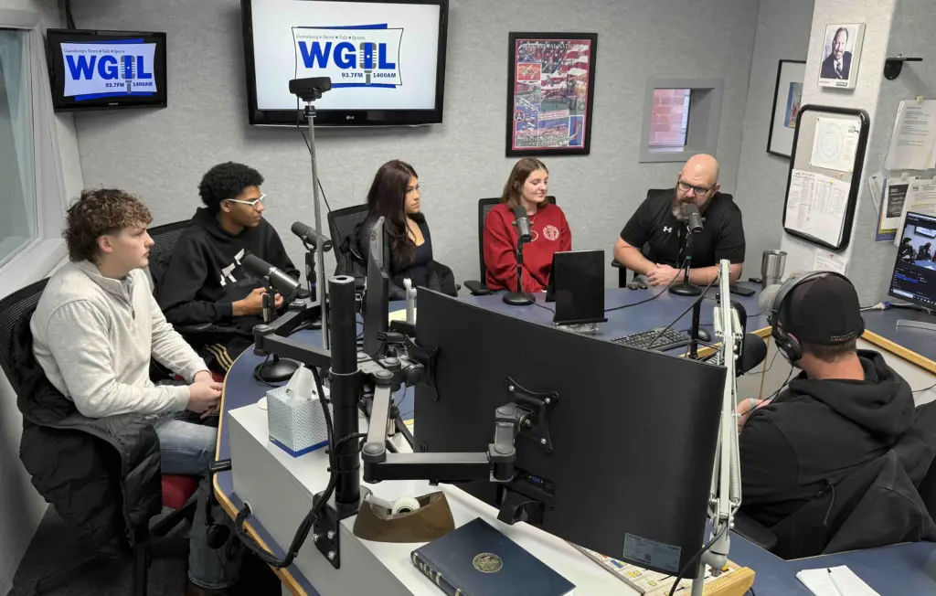 Galesburg Area Vocational Center director Adam Seaney and students Caleb Claeys, Elan Baggott, Araceli Chavez and McKenzie Goff in WGIL studio interview.