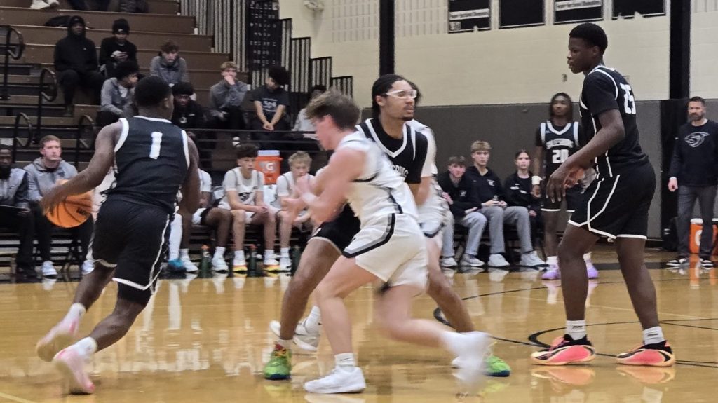 GHS boys basketball at Normal West. February 2026