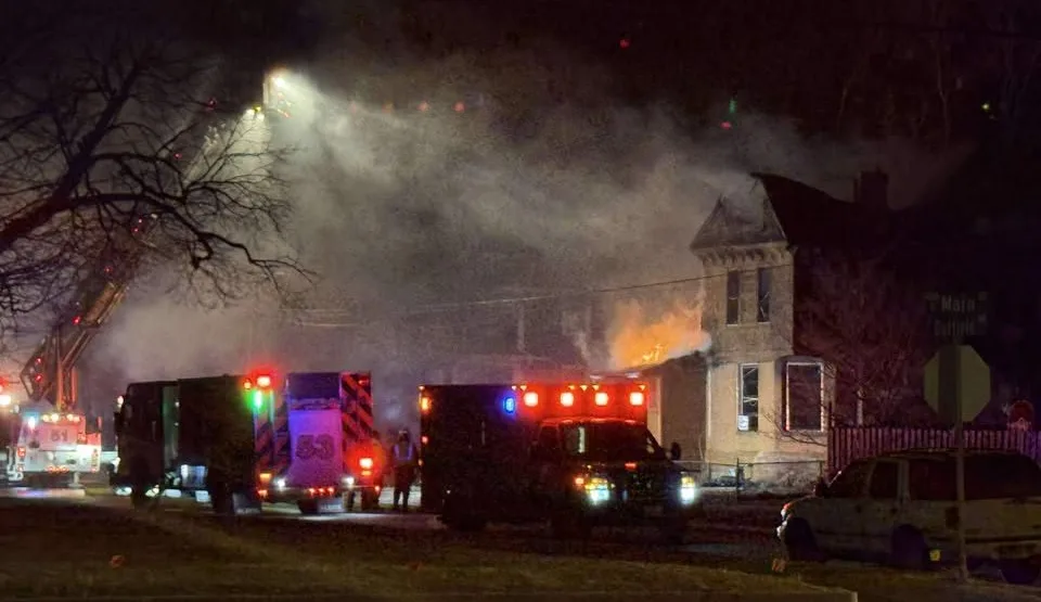 Emergency vehicles and smoke at Galesburg house fire