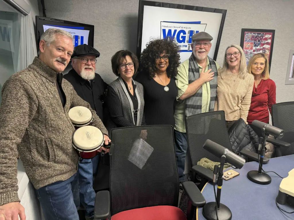 The Experience Allstar Band in the WGIL studio: Scott Grulke, Bobby Dillard, Carol Maloney, Pippi Ardennia, Daniel Leahy, Lora Wright, and Becky Fleisher, previewing their February 14 free Valentine's Day concert at Lindström’s TV & Appliance to benefit PD C.A.R.E.S. emergency aid.