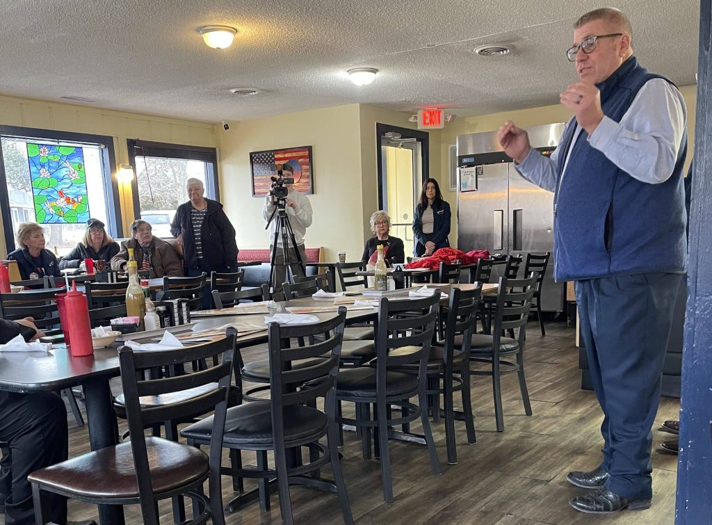 Republican gubernatorial candidate Darren Bailey speaking at Tres Cafe in Galesburg, Illinois