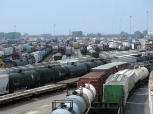 erial view of BNSF Railway classification yard in Galesburg, Illinois, showing multiple tracks with freight cars