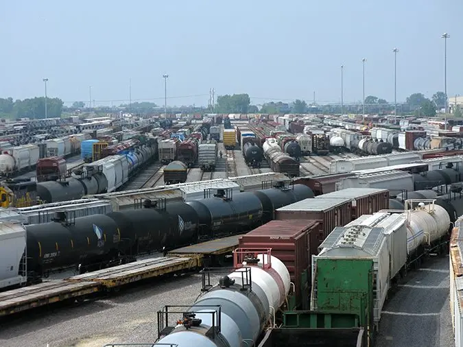 erial view of BNSF Railway classification yard in Galesburg, Illinois, showing multiple tracks with freight cars