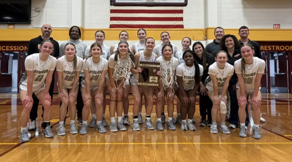 Galesburg Silver Streaks girls basketball team with regional championship trophy