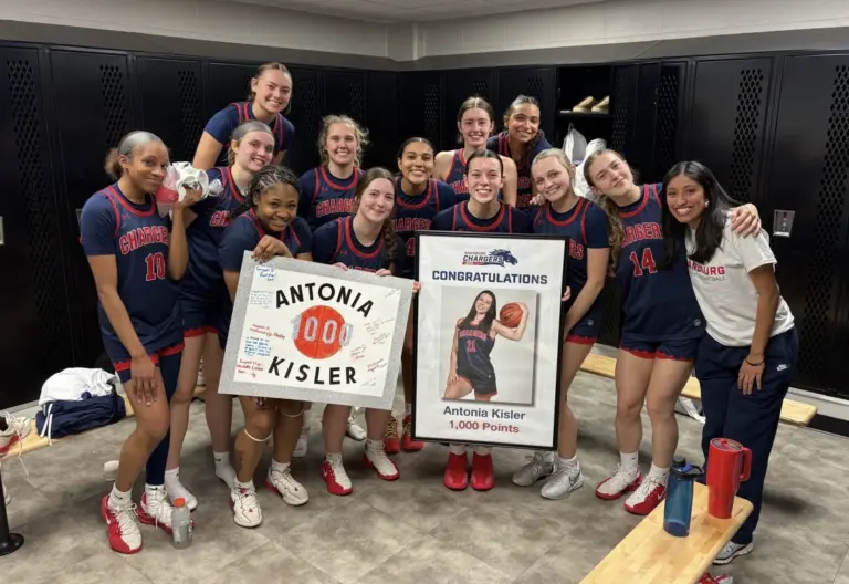 Alt text: Antonia Kisler of Carl Sandburg College celebrating her 1,000th career point