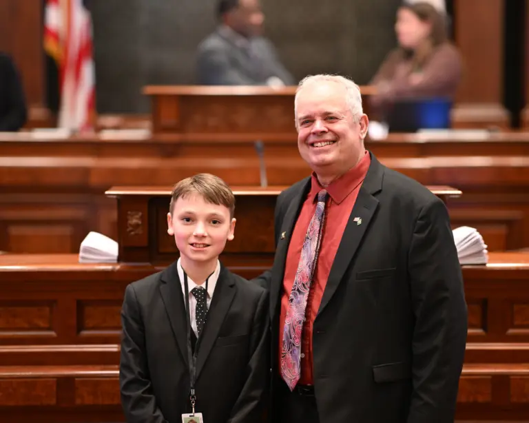 Colum Morgan and State Rep. Dan Swanson on the floor of the Illinois House of Representatives