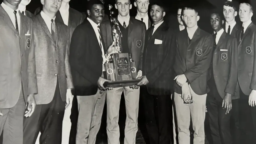 ALT TEXT Dale Kelley and Barry Swanson holding the IHSA state tournament second-place trophy, 1966 Galesburg Silver Streaks