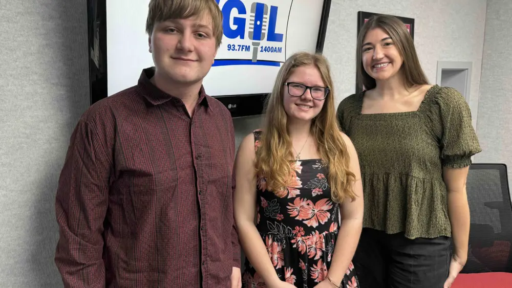 GHS students Josh Cobb and Jordan Bowton and Director of Choirs and Theatre Lucy Rieke at WGIL in Galesburg, Illinois, March 20, 2026