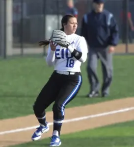 Andrea Sampson fielding in her Eastern Illinois University softball uniform