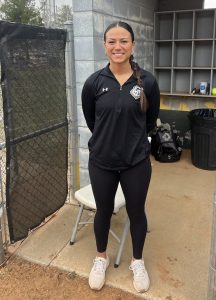 Galesburg High School softball coach Andrea Sampson in the dugout