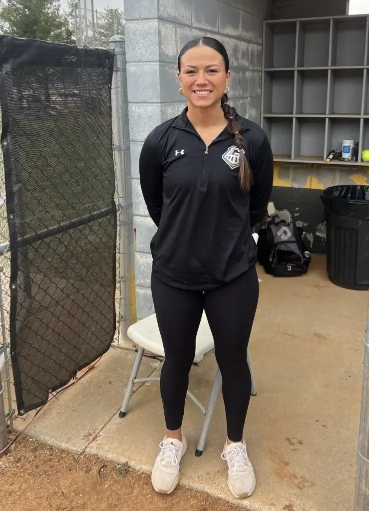 Galesburg High School softball coach Andrea Sampson in the dugout
