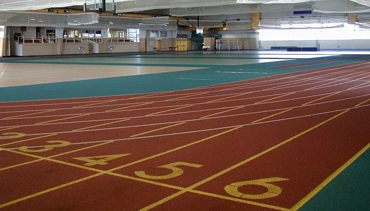 Interior of the T. Fleming Fieldhouse at Knox College showing the existing track surface