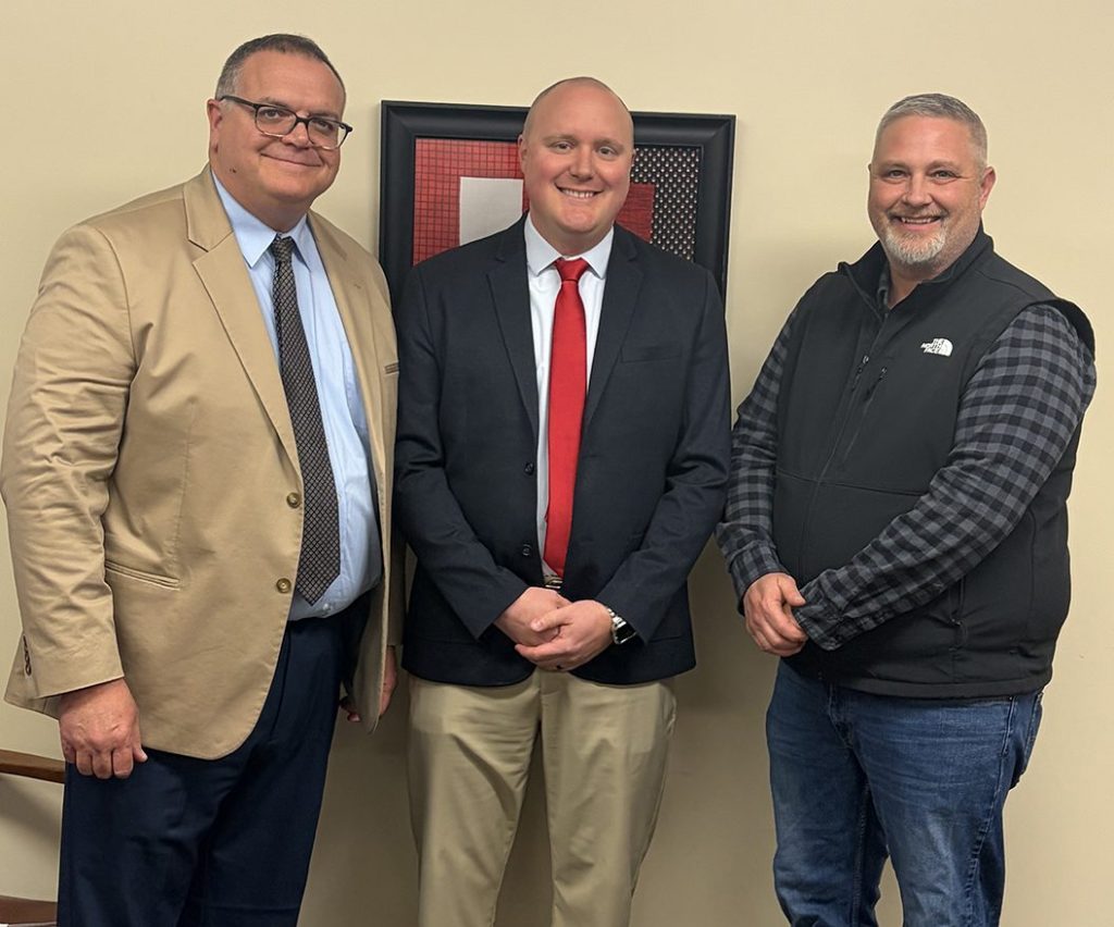 United CUSD 304 Superintendent Tom Hawkins, incoming principal Michael Washabaugh, and board president Scott Campbell